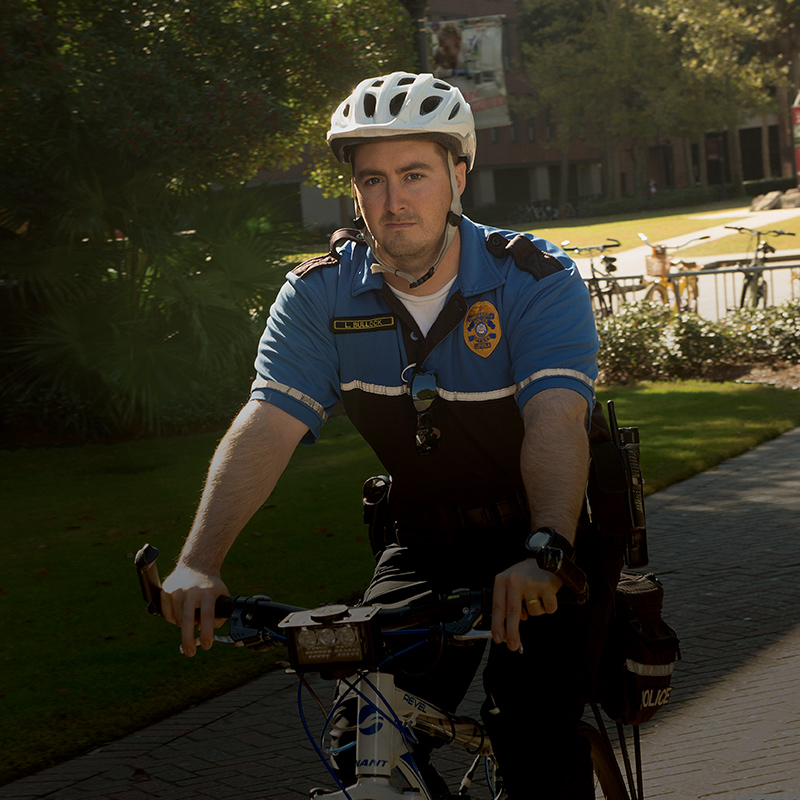 LUPD member on bicycle