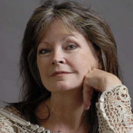 Patti Adams with hand on her face