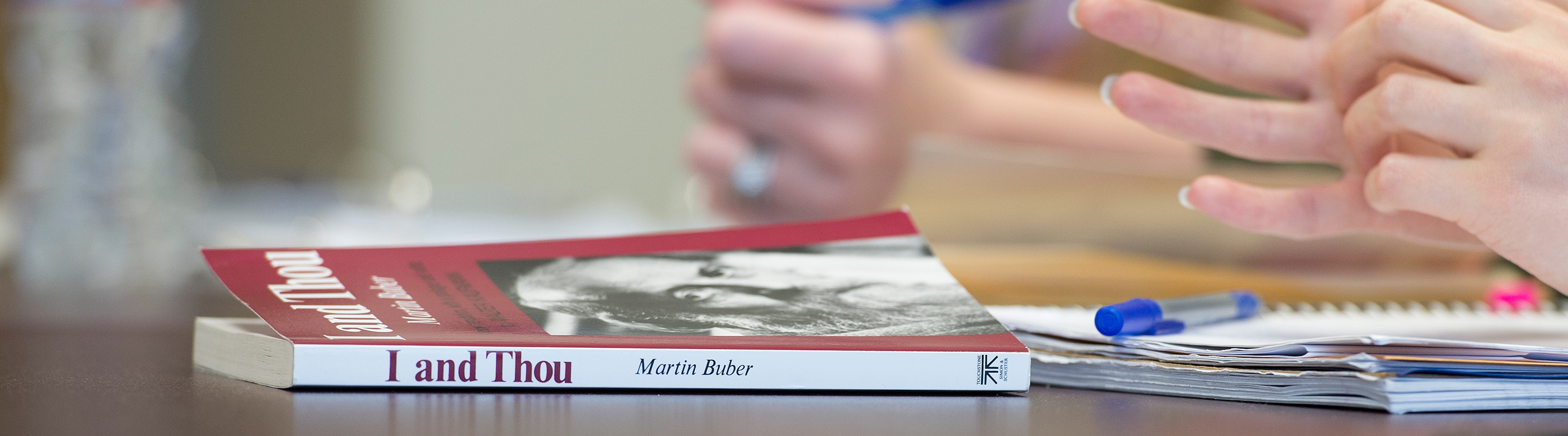 Student hands over philosophy book