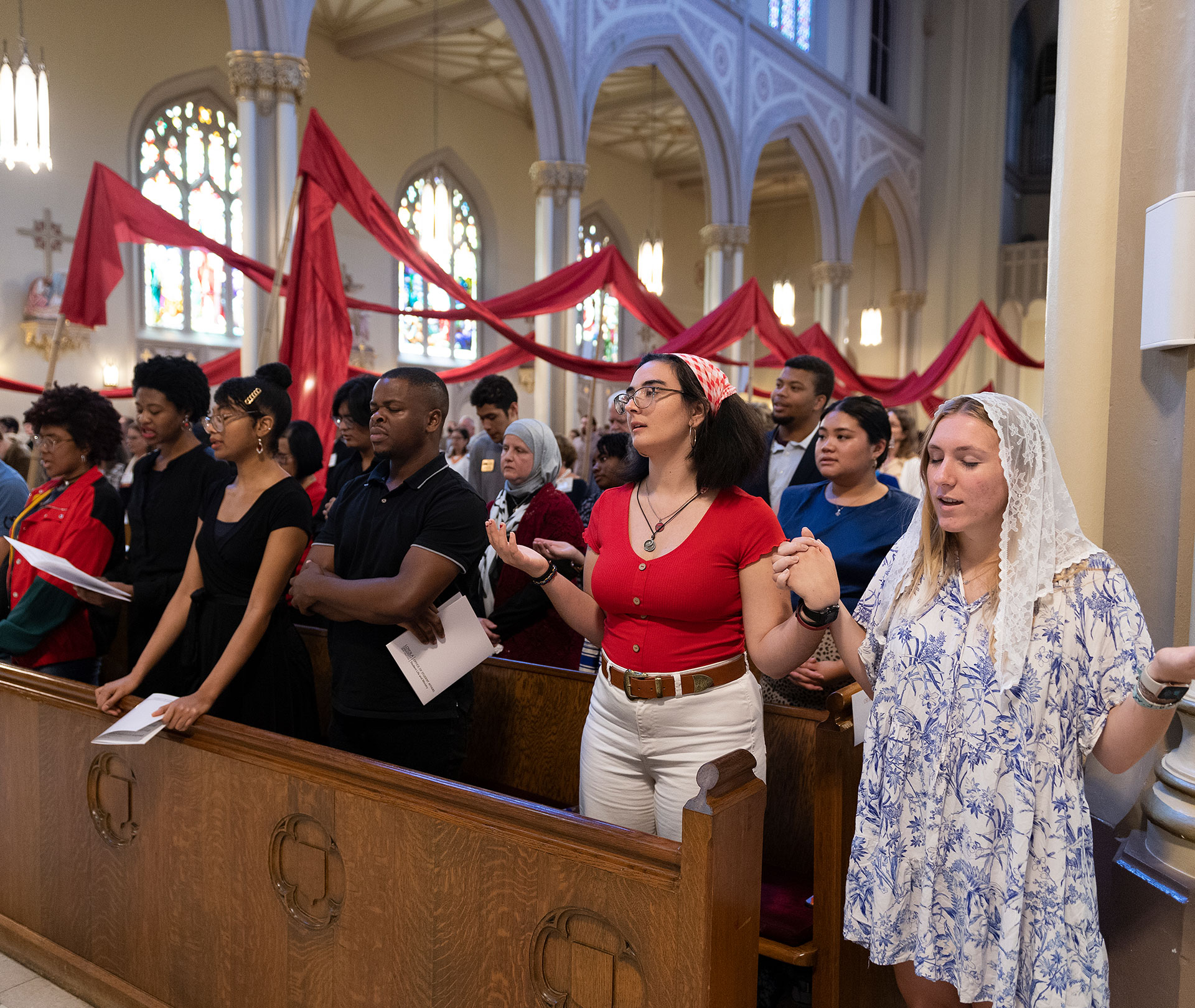 Students Praying at Mass